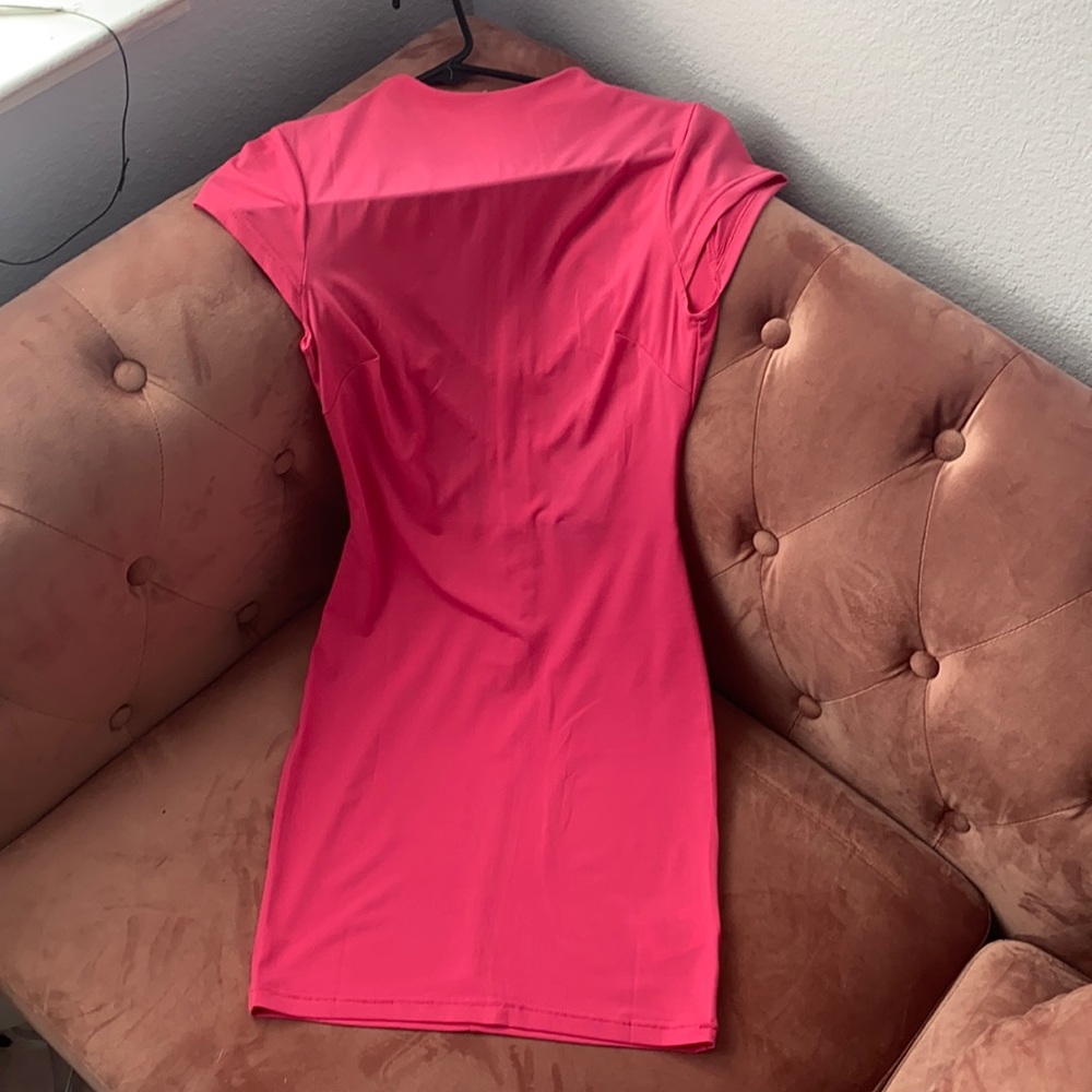 Hot pink mini dress.